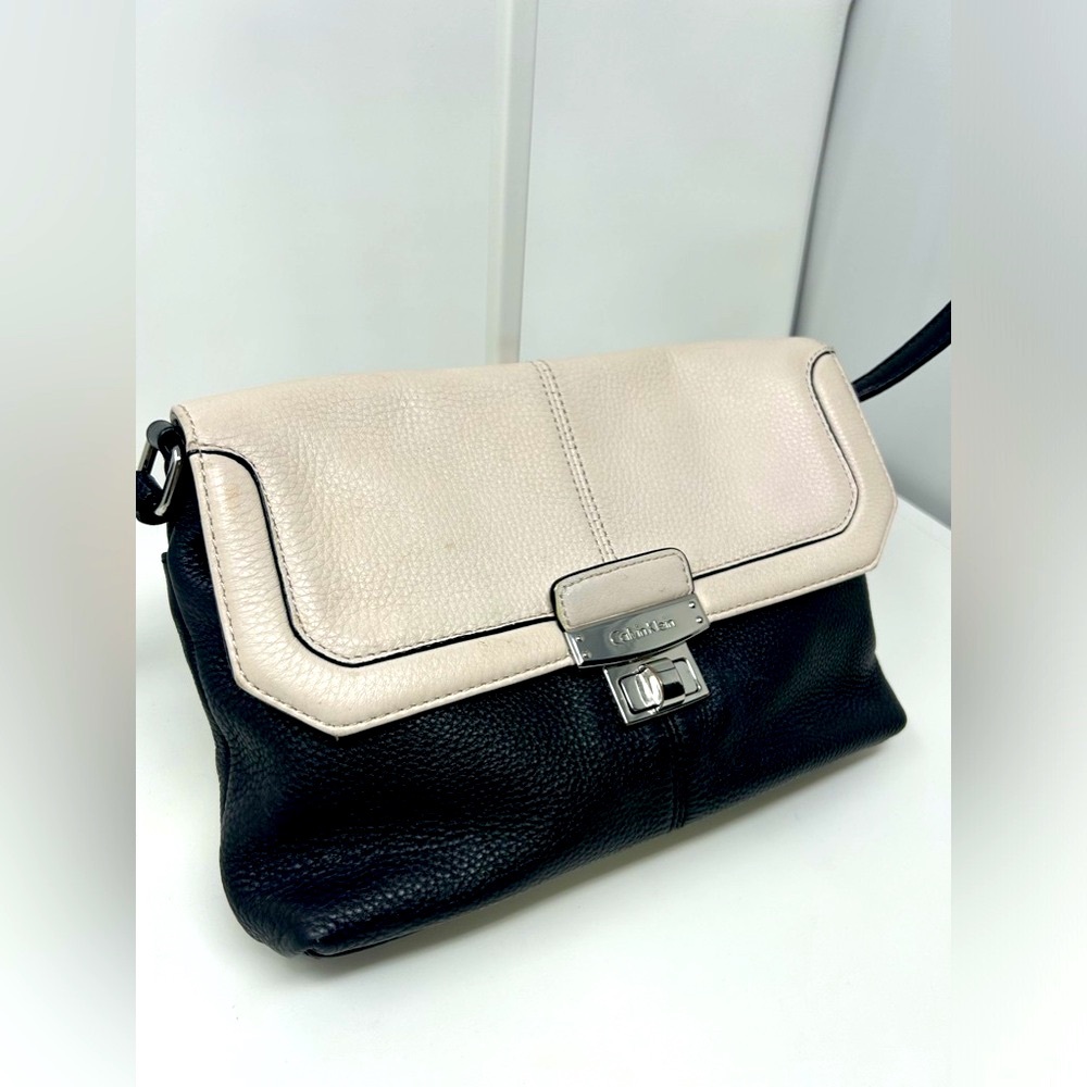 Calvin Klein Black and White Pebble Leather crossbody with magnetic closure